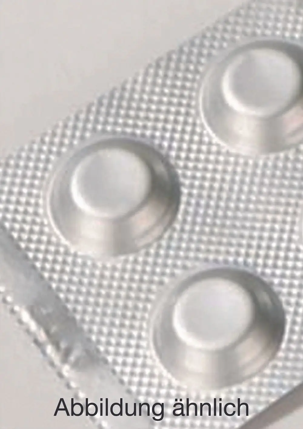 Aluminiumfolie mit mehreren geschlossenen Blisterpackungen, die runde Tabletten enthält; zu sehen sind nur zwei der Blisterkuppeln der Marke Judo.